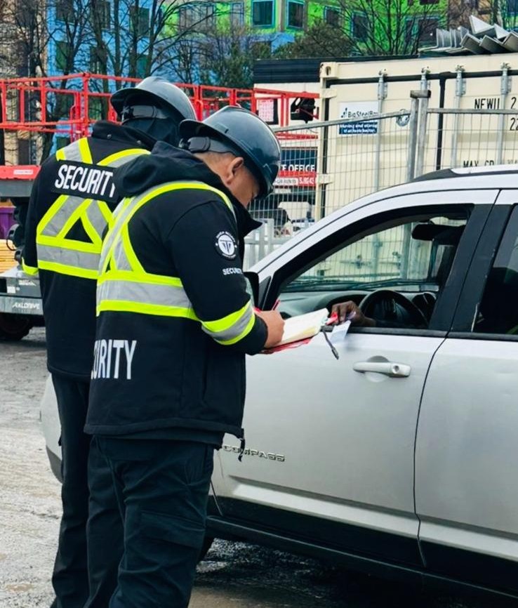 Licensed security guard monitoring Construction site entrance in Ottawa
