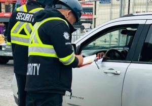 Licensed security guard monitoring Construction site entrance in Ottawa